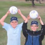 kids with autograph golf ball